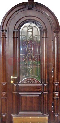 Арочная металлическая дверь массив со стеклом и ковкой ДА-50 в Пензе