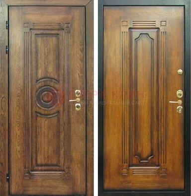 Коричневая металлическая дверь с массивом дуба с рисунком ДМД-10 в Пензе