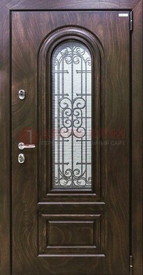 Темная филенчатая железная дверь со стеклом и ковкой ДСК-102 в Пензе