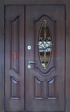 Темная металлическая дверь Винорит со стеклом и ковкой ДСК-239 в Пензе
