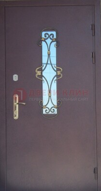 Металлическая дверь со стеклом и ковкой ДСК-77 в Пензе